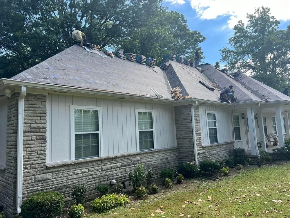 Slide of Moores Roofing