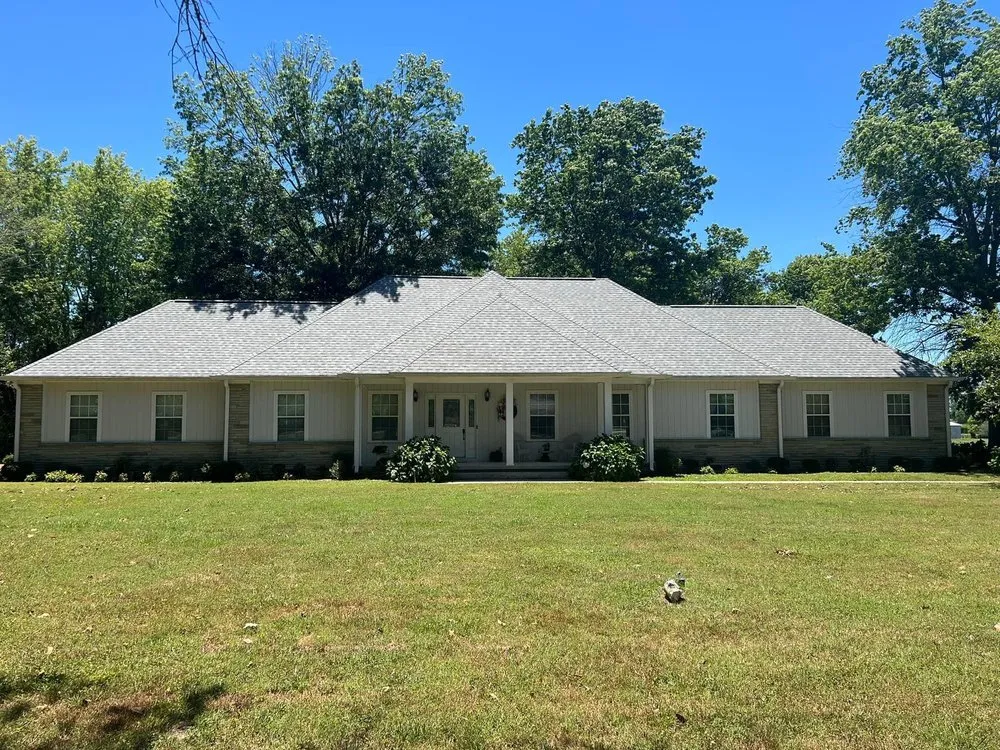 Slide of Moores Roofing