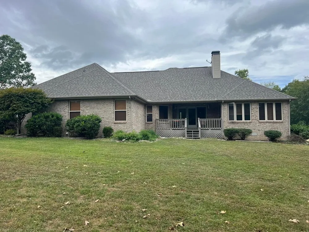 Slide of Moores Roofing