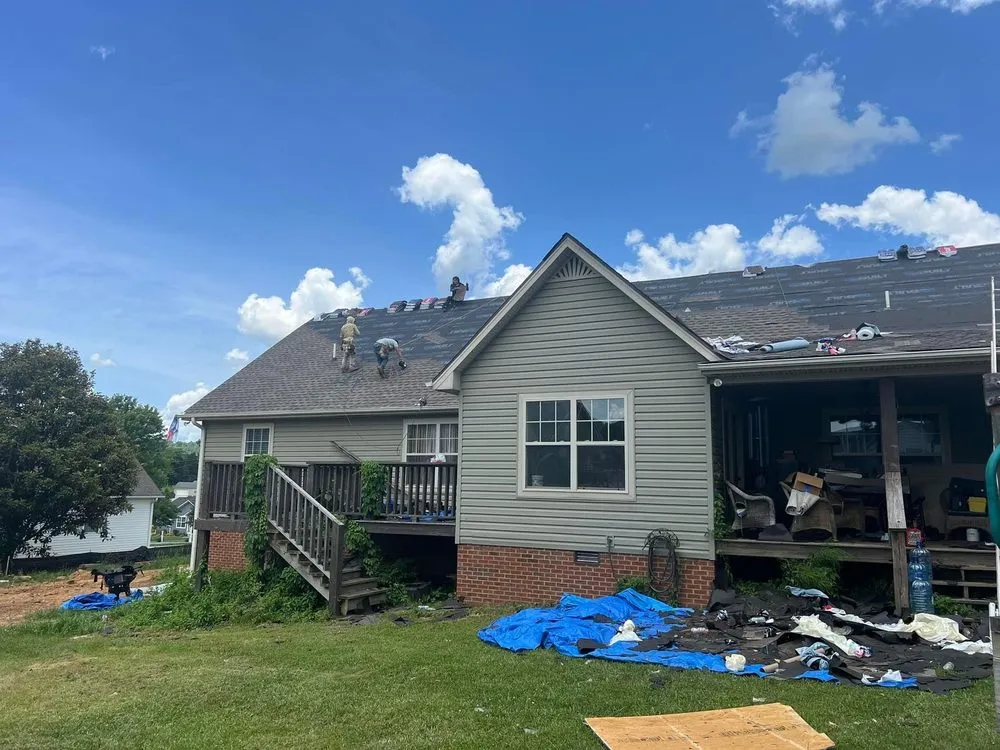 Slide of Moores Roofing