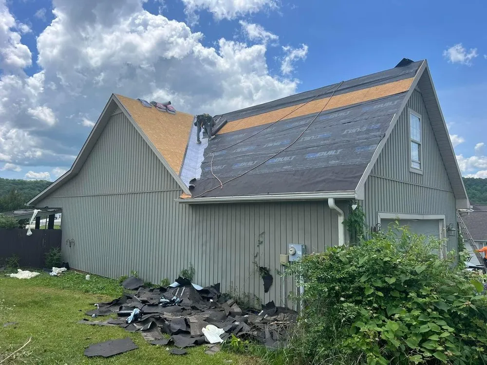 Slide of Moores Roofing