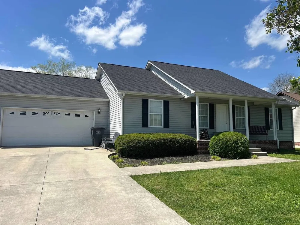 Slide of Moores Roofing