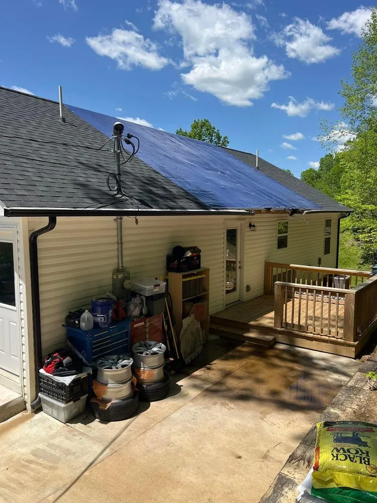 Slide of Moores Roofing