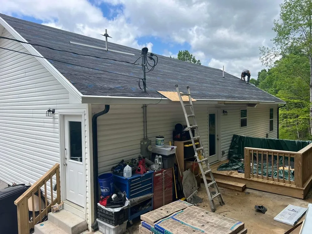 Slide of Moores Roofing