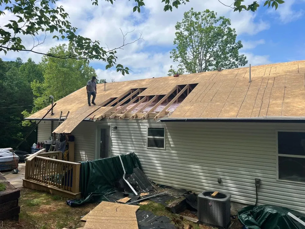 Slide of Moores Roofing