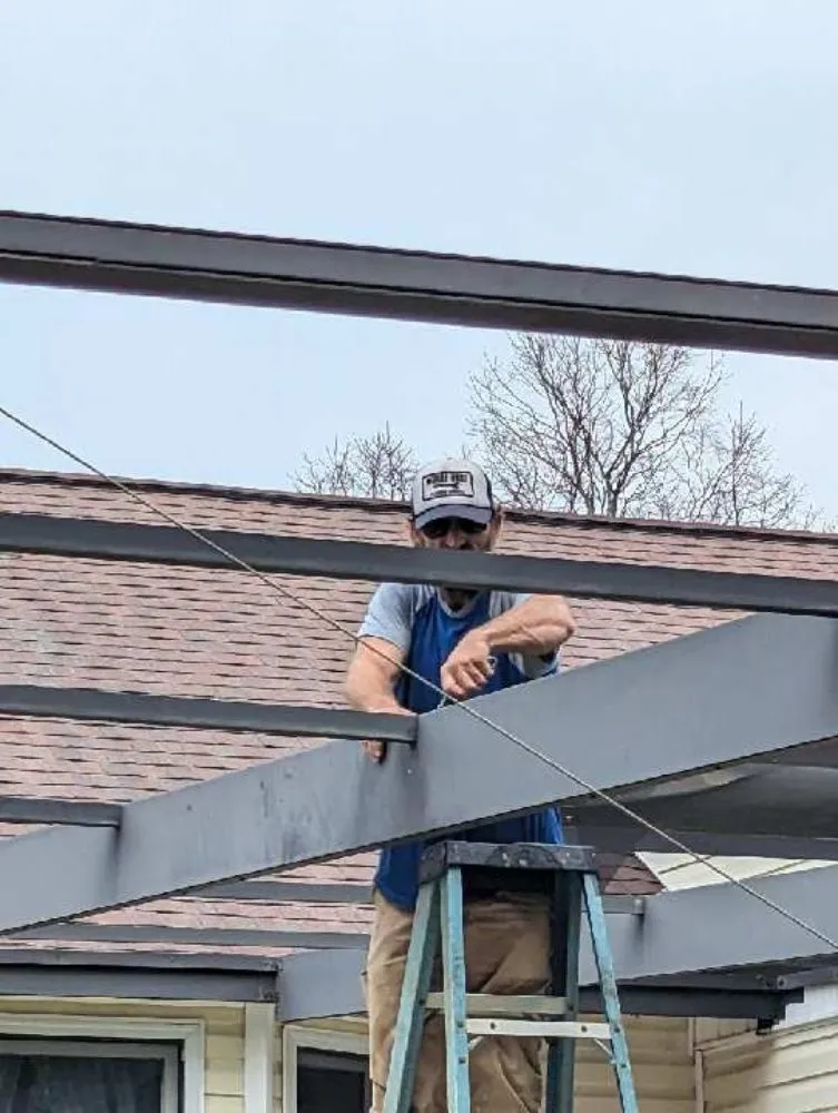 Slide of Moore's Roofing