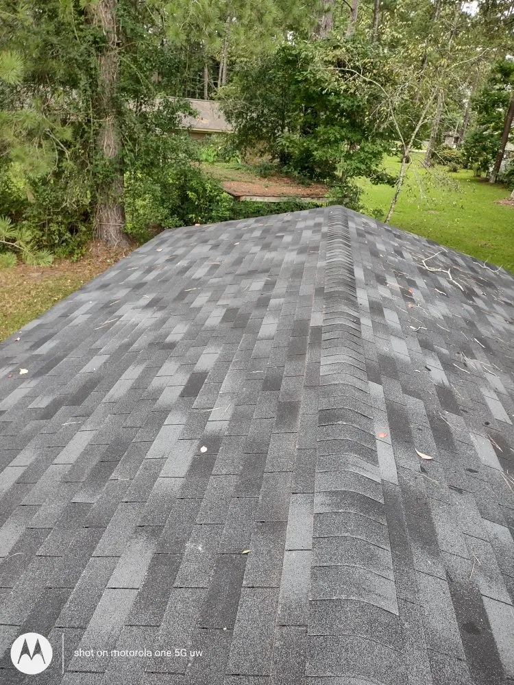 Slide of Moore's Roofing