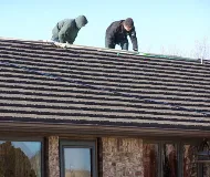 Slide of Moore's Roofing