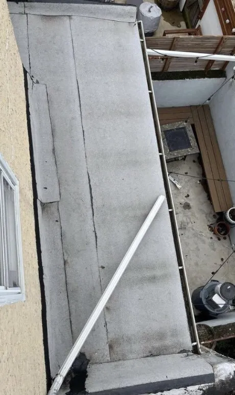 Slide of Moore's Roofing