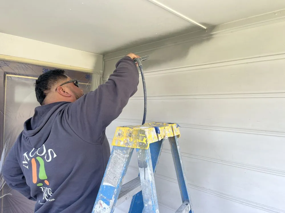 Slide of Moos Def Exteriors & Painting