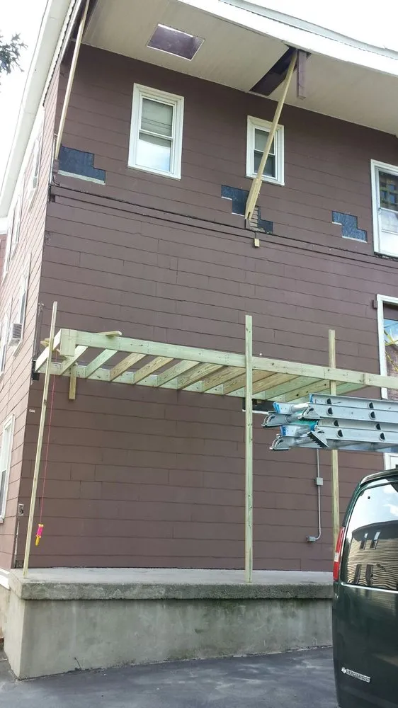 Local flat roof repair for homes in Dorchester, MA by Morales General Contracting
