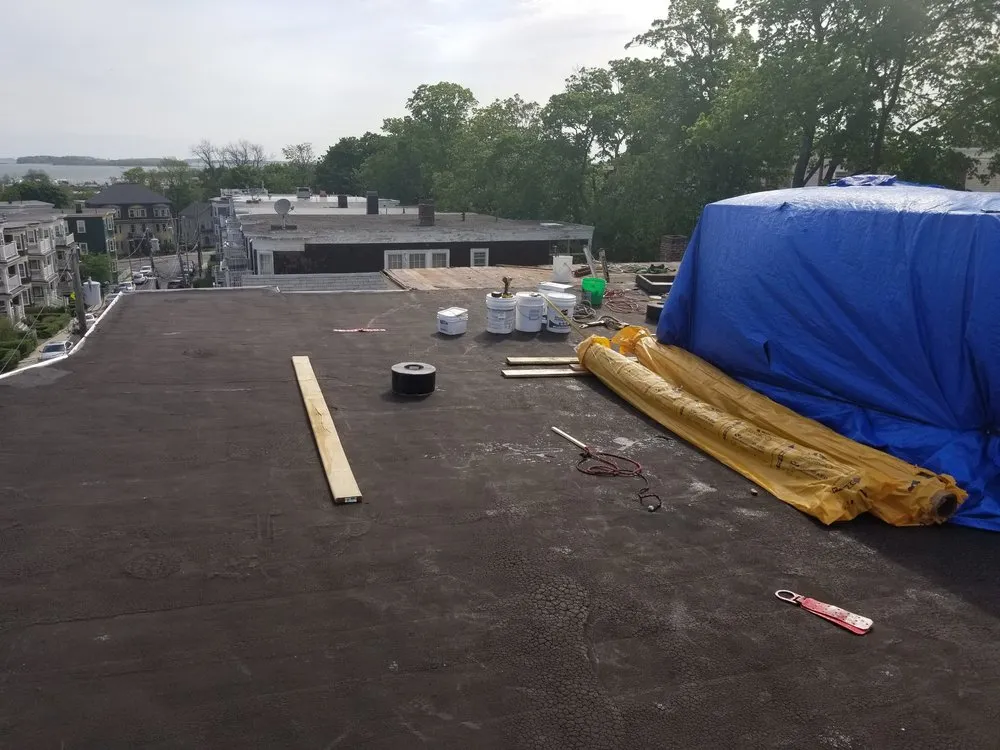 Professional roof replacement in Dorchester, MA by Morales General Contracting