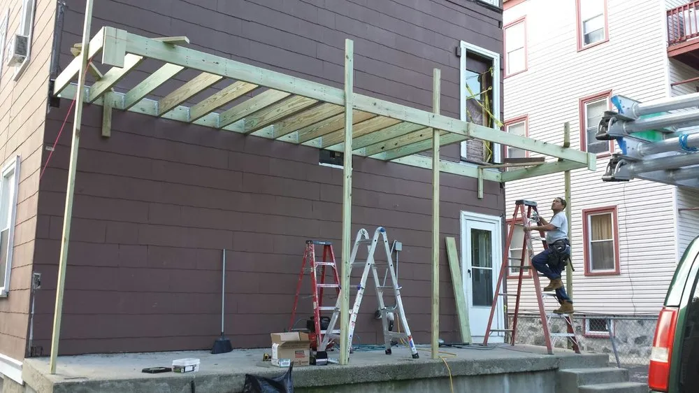 Top-rated residential roofing service after storm damage in Dorchester, MA by Morales General Contracting