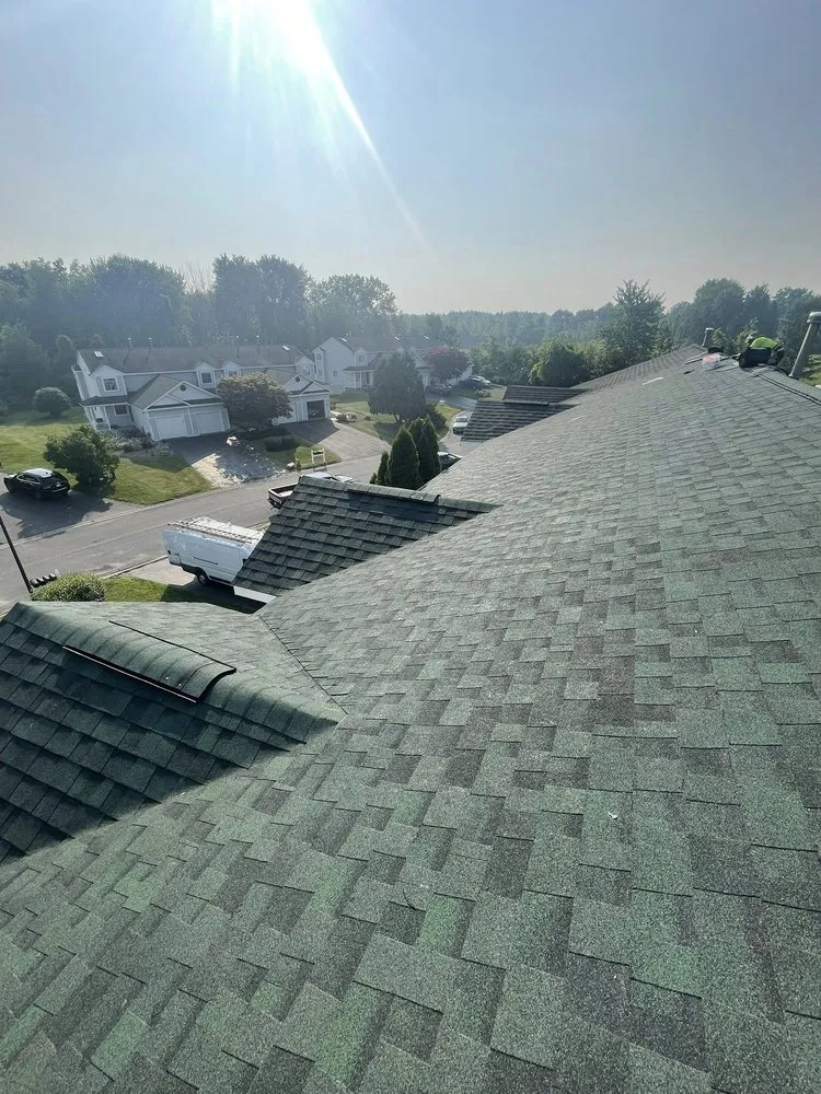 Professional storm damage roof repair after storm damage across Kirkville, NY - Morgillo Construction