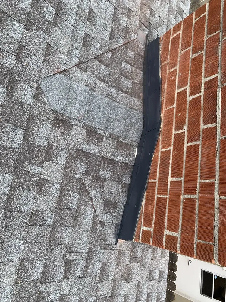 Slide of Mo's Professional Roofing