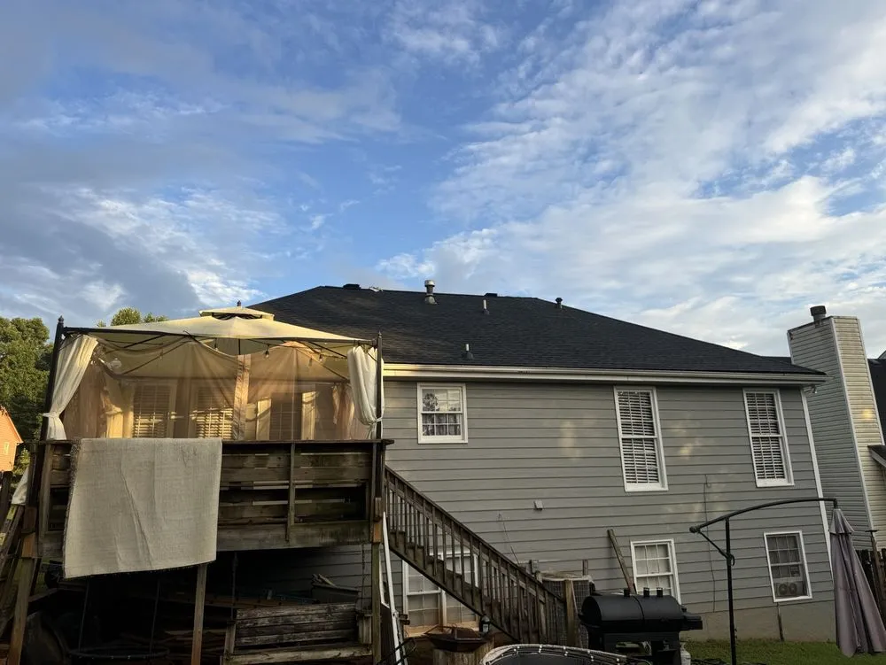 Slide of Mosaic Roofing Company