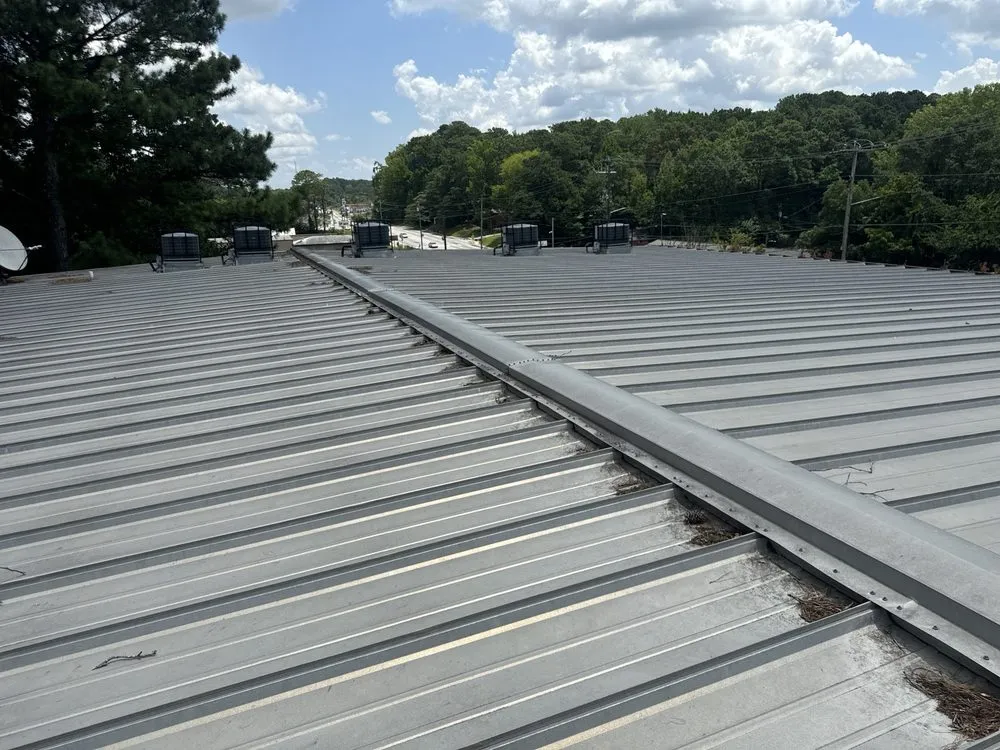 Slide of Mosaic Roofing Company