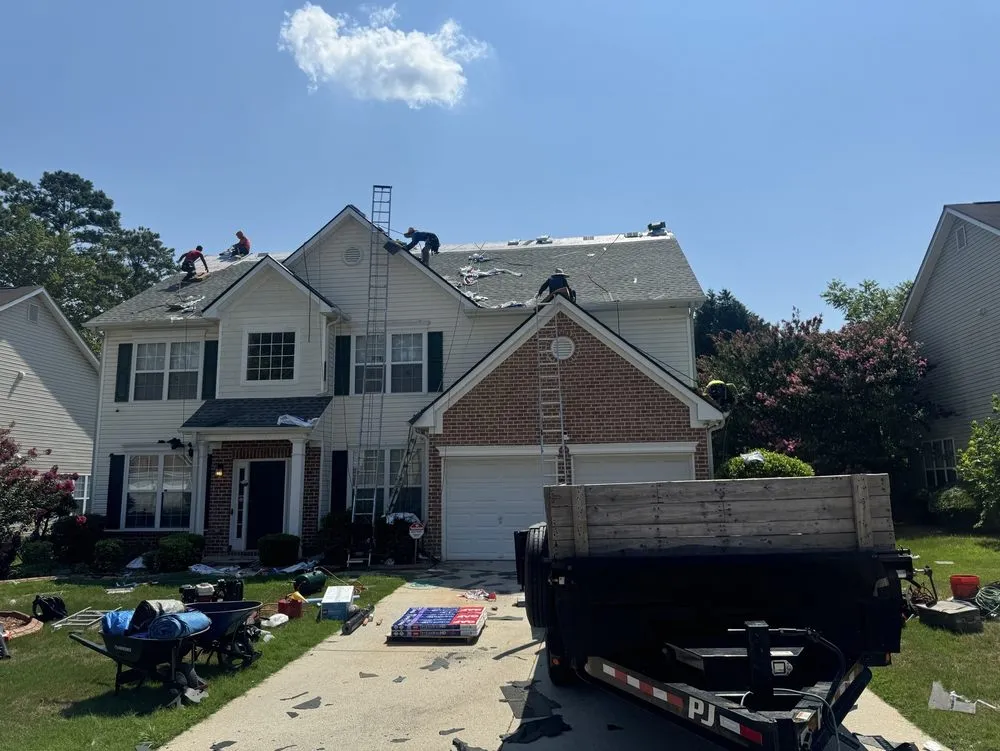 Slide of Mosaic Roofing Company