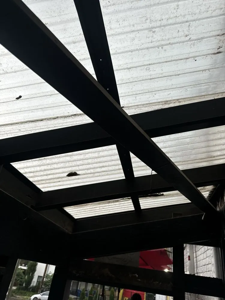 Slide of Mosaic Roofing Company