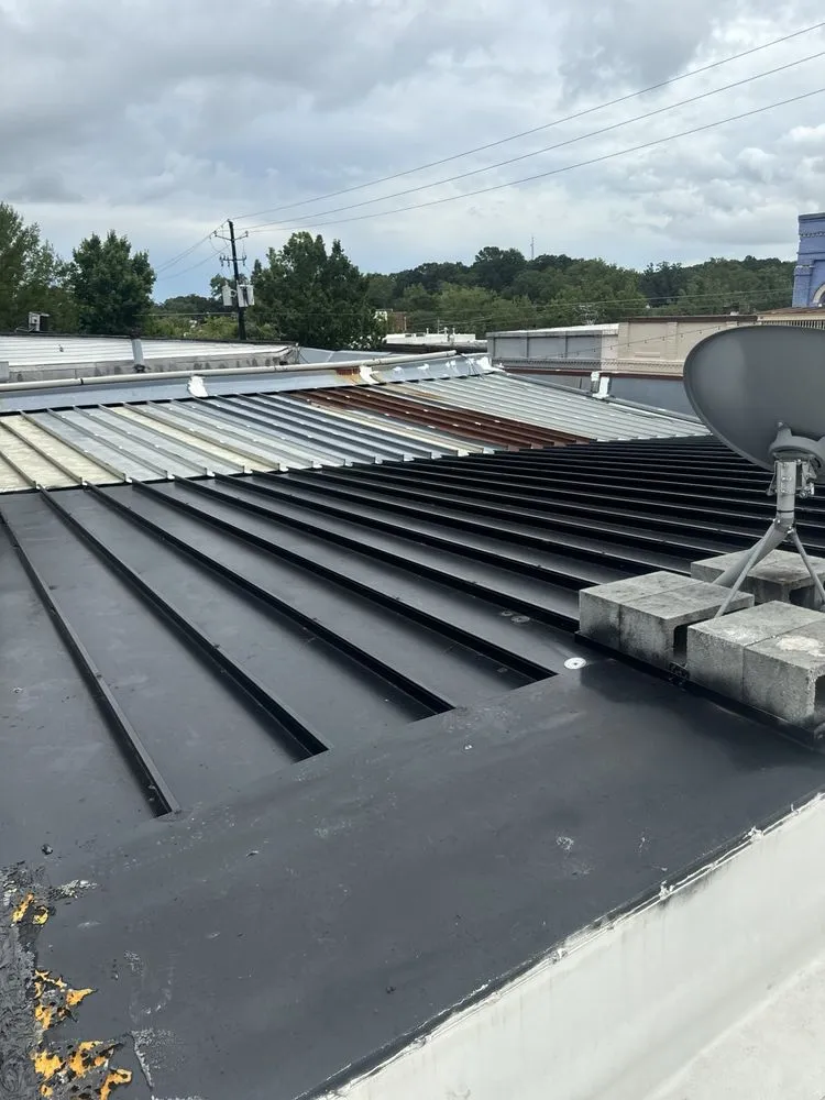 Slide of Mosaic Roofing Company