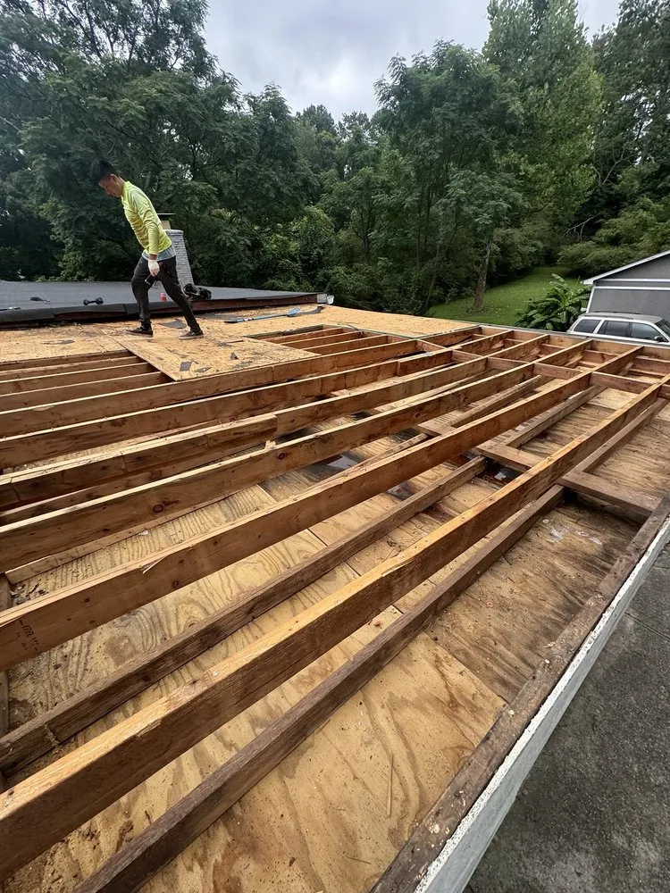 Slide of Mosaic Roofing Company