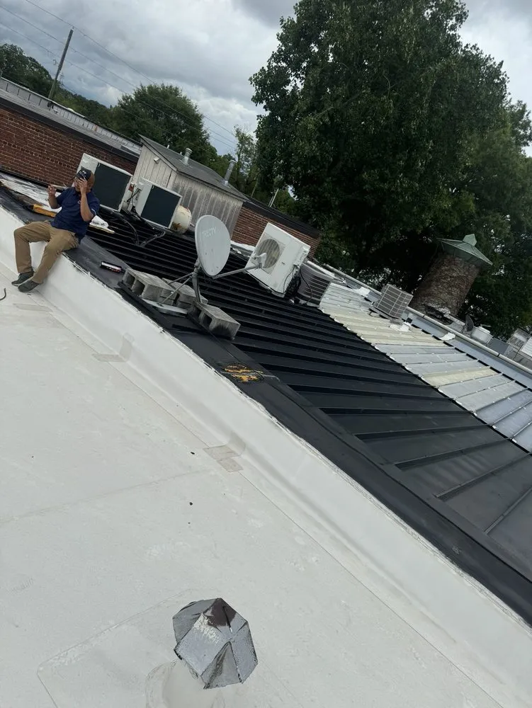 Slide of Mosaic Roofing Company