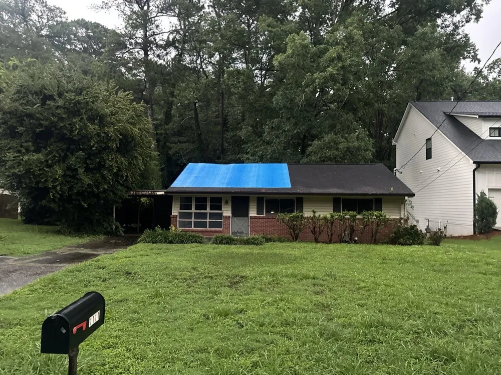 Slide of Mosaic Roofing Company