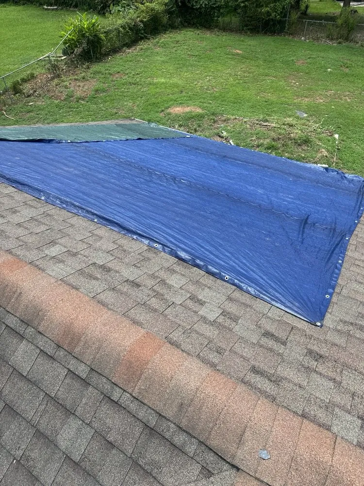 Slide of Mosaic Roofing Company