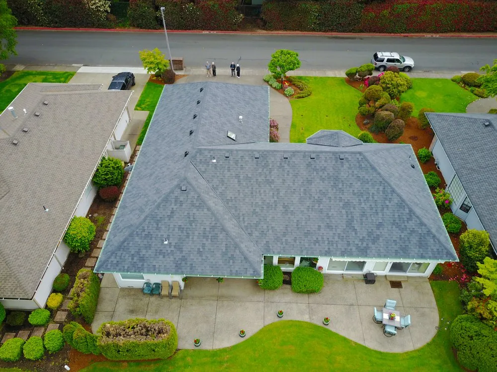 Slide of Moser Roofing