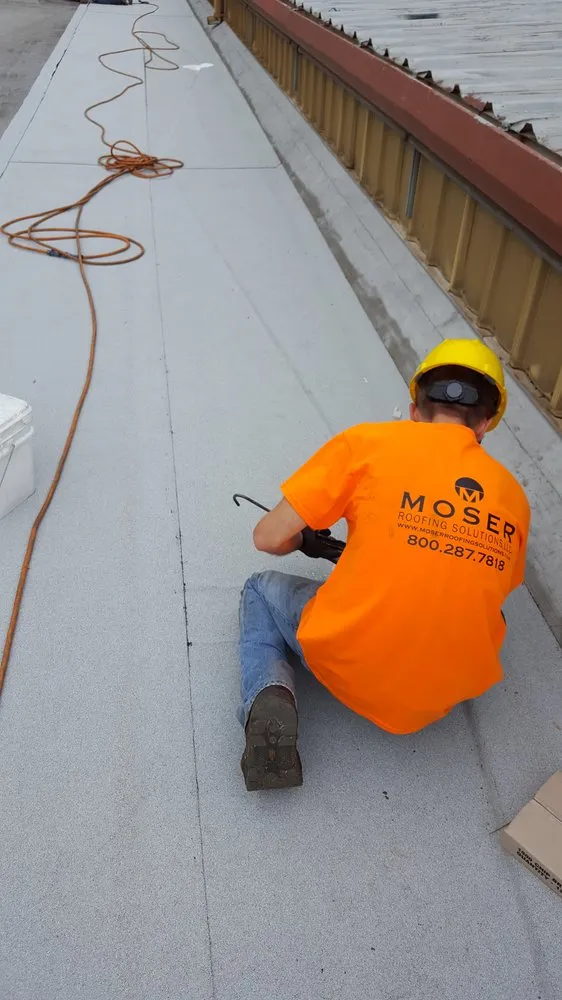 Slide of Moser Roofing Solutions