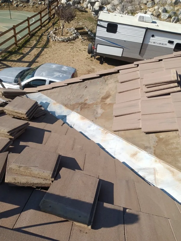 Slide of Moses Roofing