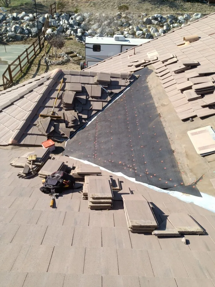 Slide of Moses Roofing