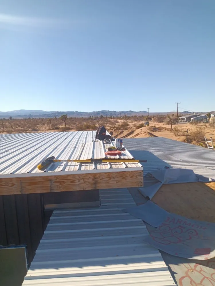 Slide of Moses Roofing