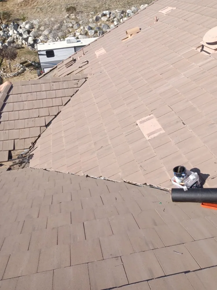 Slide of Moses Roofing