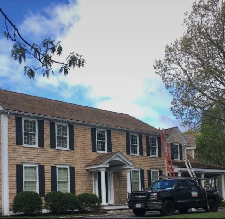 Slide of Moss Boss Roof Cleaning & House Washing