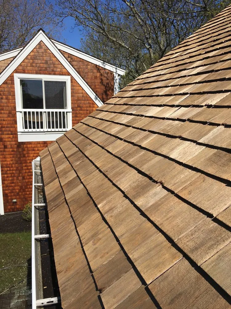 Slide of Moss Boss Roof Cleaning & House Washing