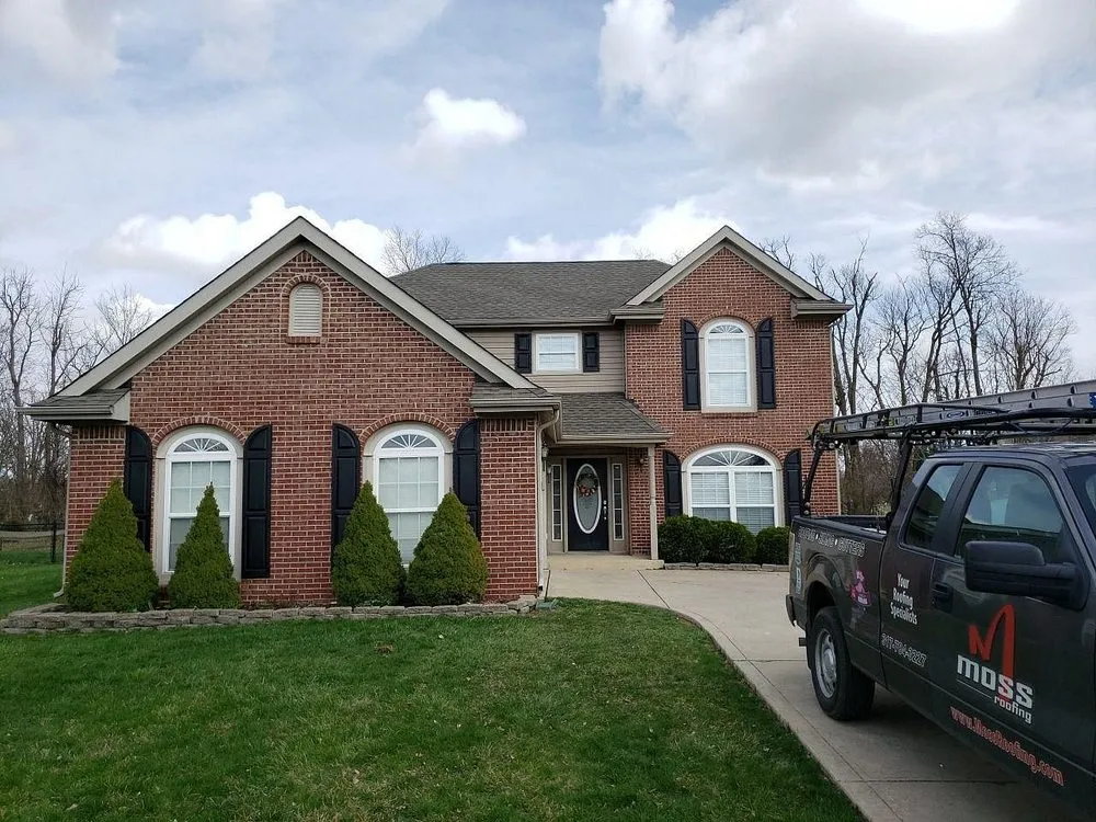 Slide of Moss Roofing