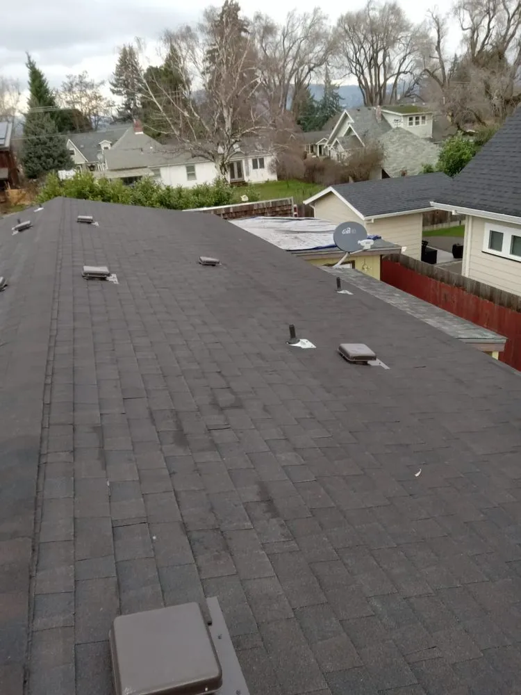 Slide of Moss Roofing Solutions