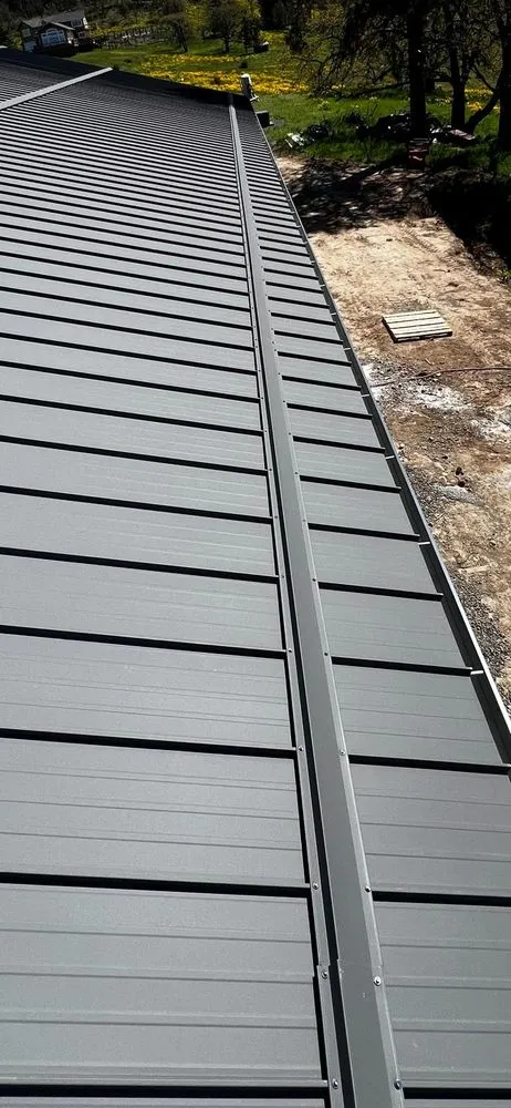 Slide of Moss Roofing Solutions