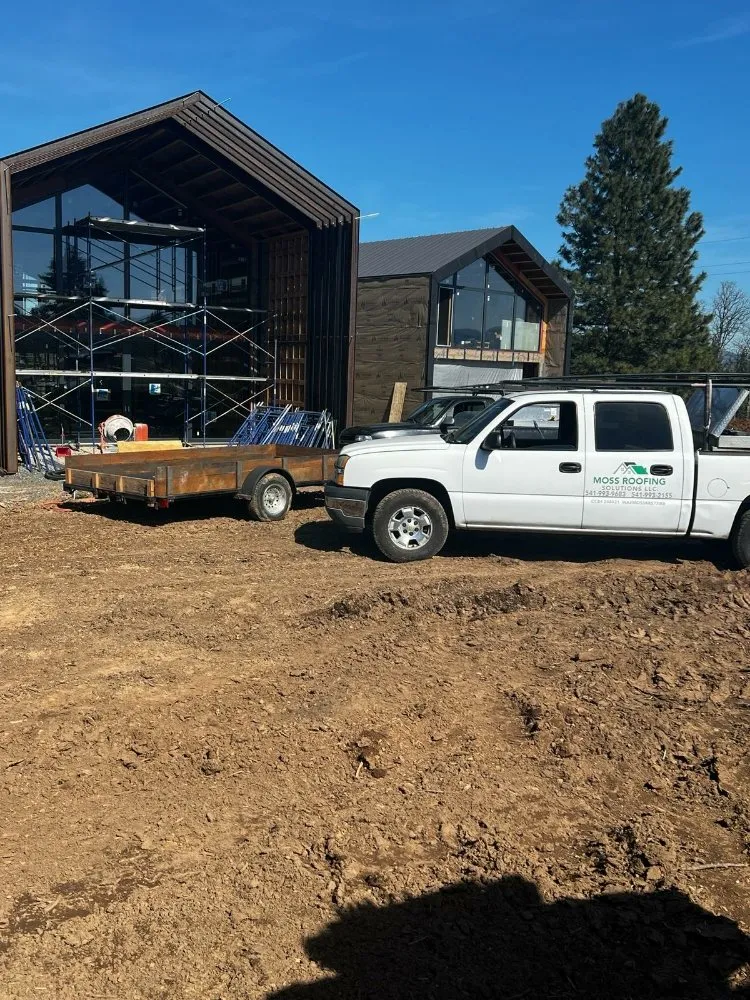 Slide of Moss Roofing Solutions