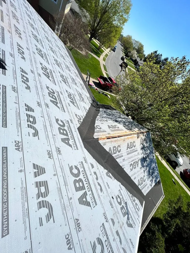 Slide of Motto's Roofing and Construction