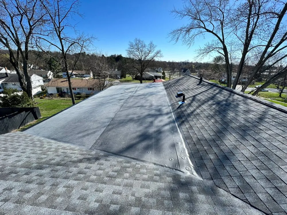 Slide of Motto's Roofing and Construction