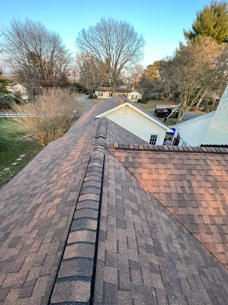 Slide of Motto's Roofing and Construction