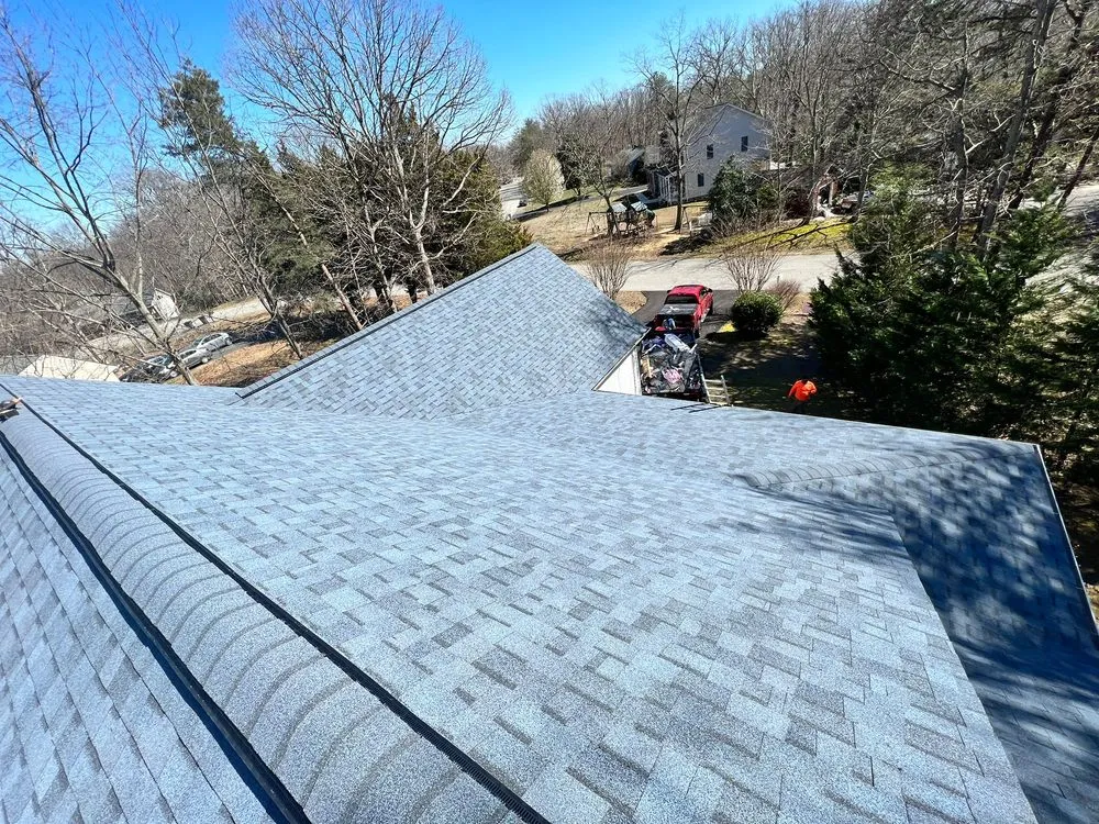 Slide of Motto's Roofing and Construction