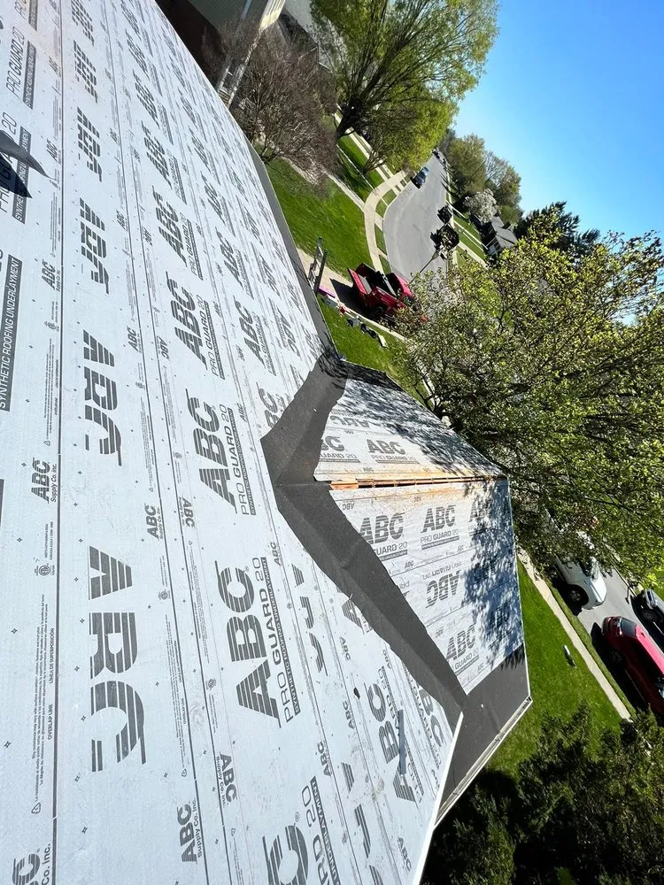 Slide of Motto's Roofing and Construction