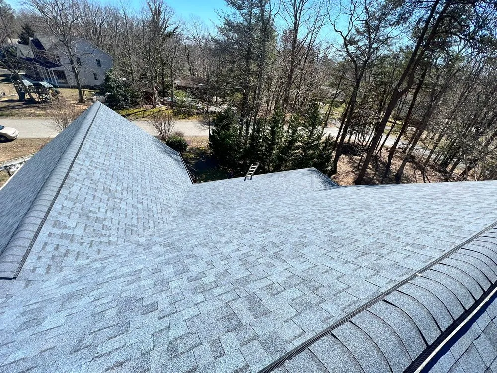 Slide of Motto's Roofing and Construction