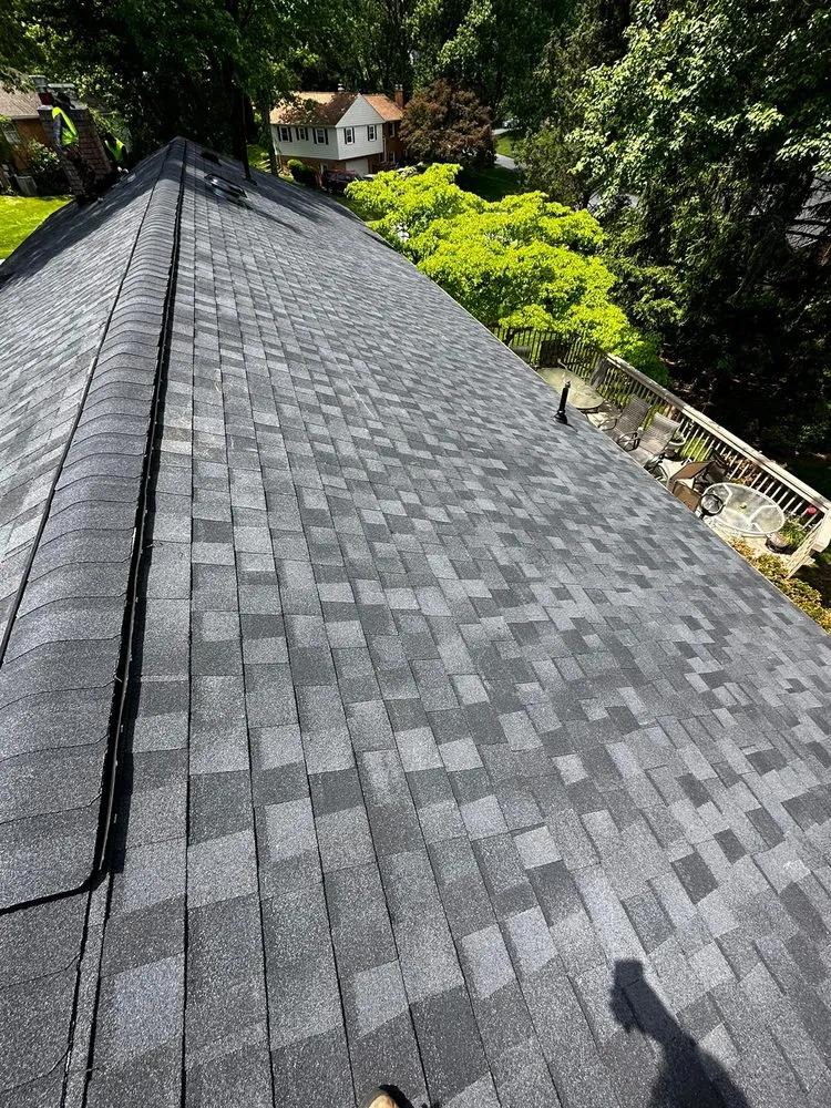 Slide of Motto's Roofing and Construction