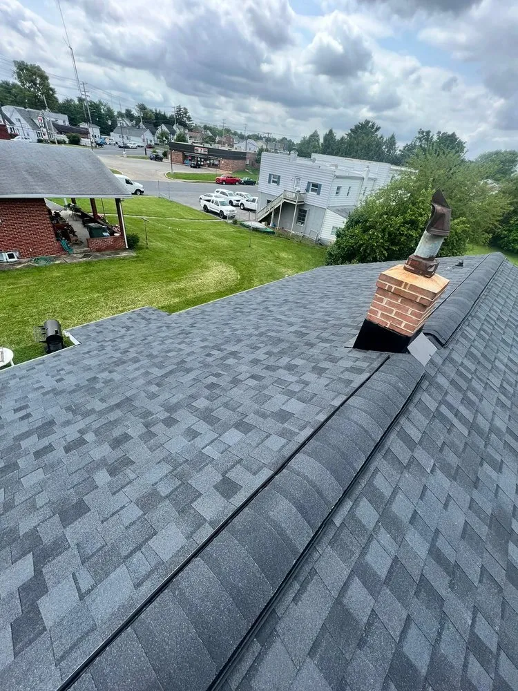 Slide of Motto's Roofing and Construction