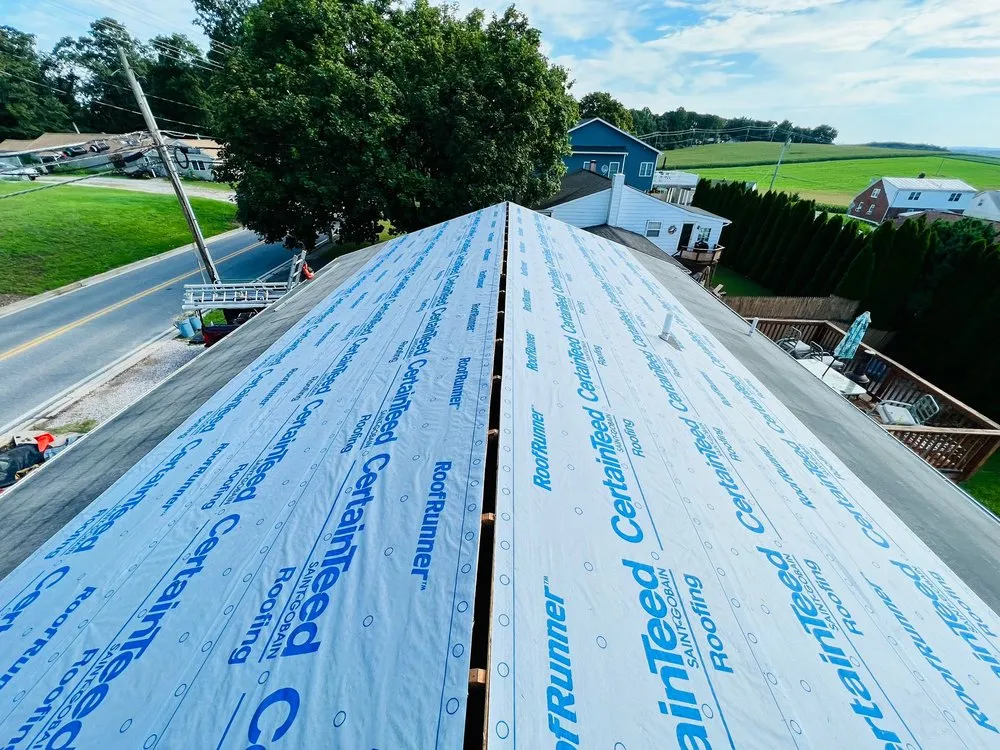 Slide of Motto's Roofing and Construction