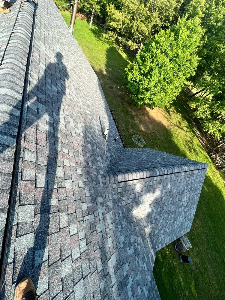 Slide of Motto's Roofing and Construction